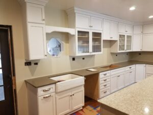 white kitchen cabinets with crown molding installation